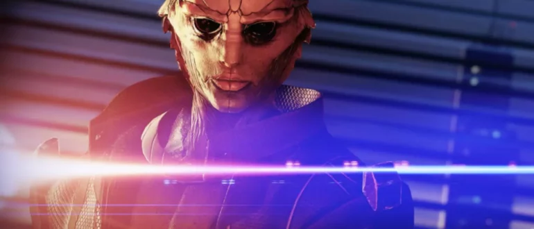 Mass Effect spēles ekrānšāviņš, kurā redzams varonis ar masku, kas izgaismota ar zilām un oranžām gaismām.