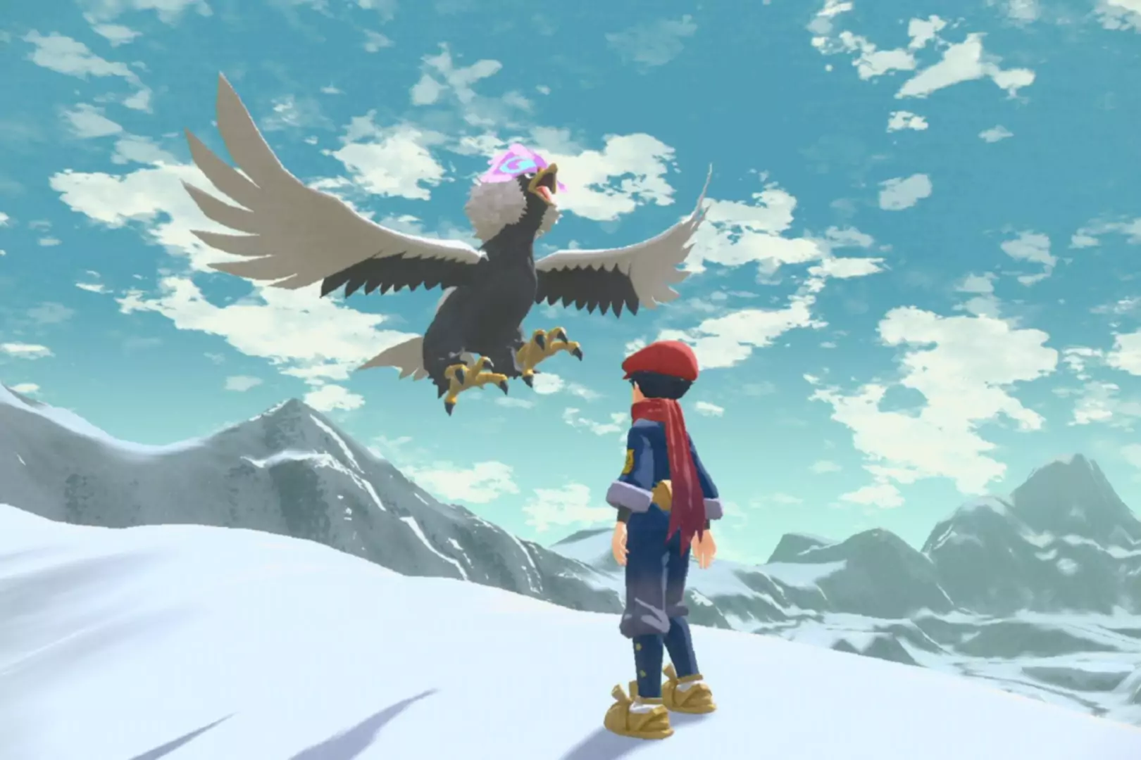 Pokemon Legends Arceus ekrānšāviņš, kurā attēlots tēls, kas skatās uz lidojošiem pokemoniem uz sniegota kalna