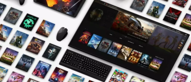 TV slušalke, tipkovnica, računalniška miška in krmilnik Xbox, nameščeni poleg umetnine Microsoftove videoigre.