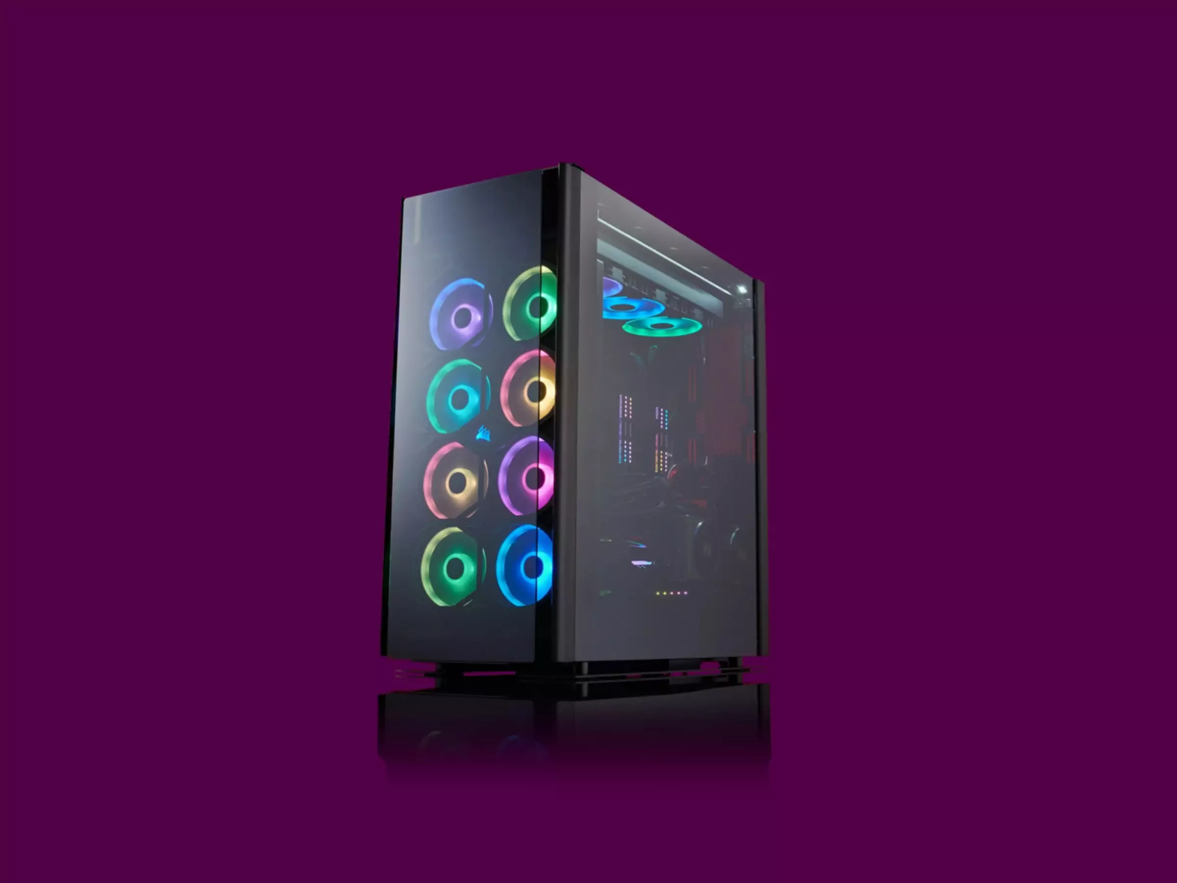 Spēļu dators, kas izgaismots ar krāsainām gaismām